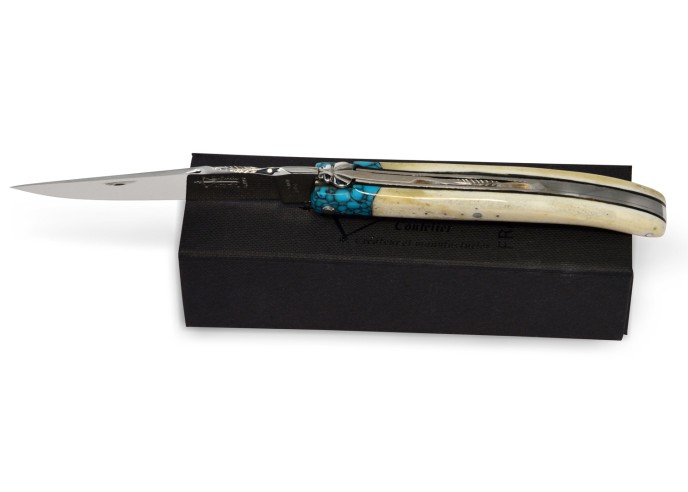 Laguiole pliant Forgé, manche en os de 12 cm avec une fausse mitre turquoise, finition brillant
