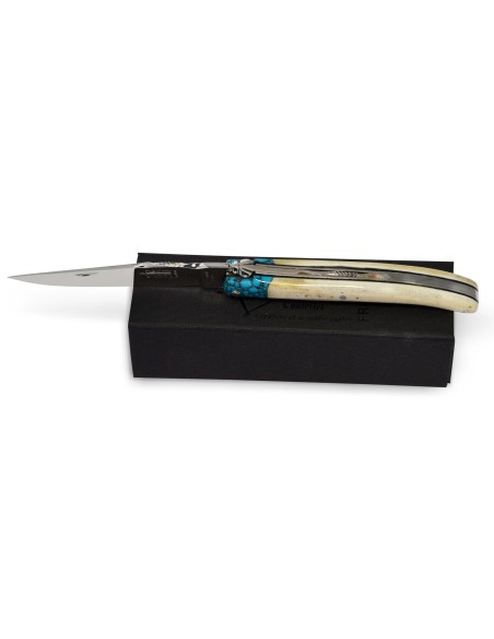Laguiole pliant Forgé, manche en os de 12 cm avec une fausse mitre turquoise, finition brillant